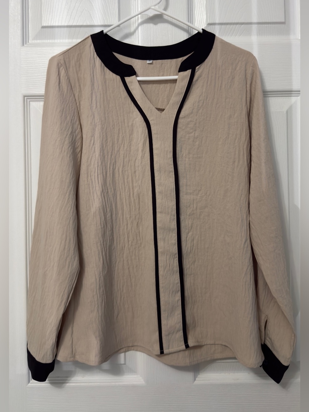 Beige Long-Sleeve Blouse with Black Trim
